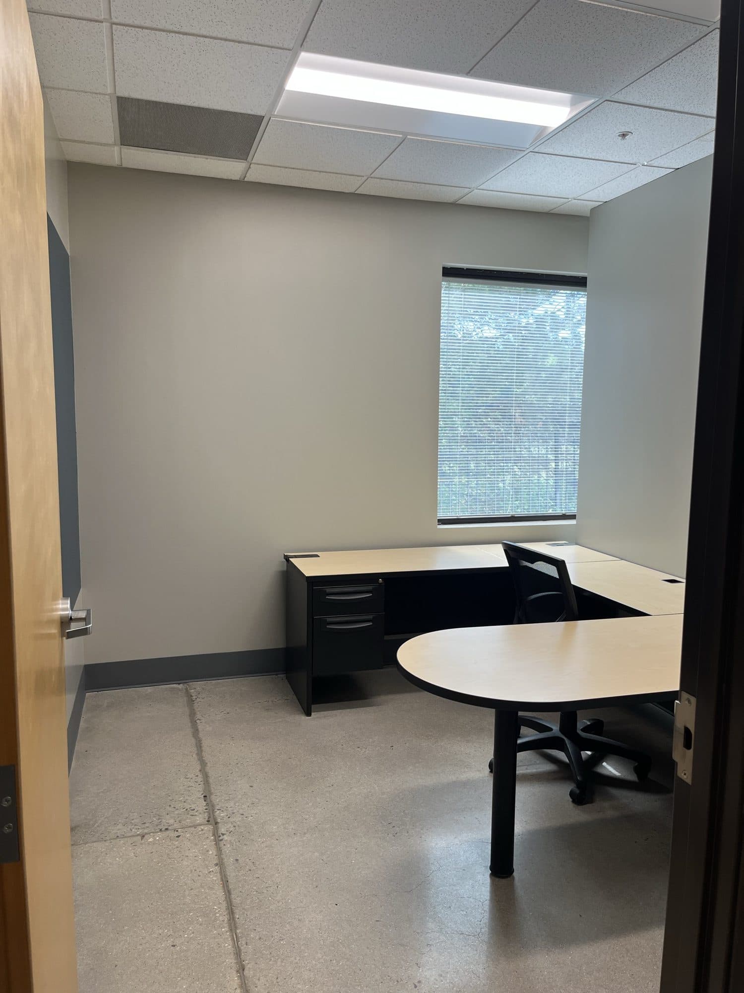 Office 7 — window office with L-desk